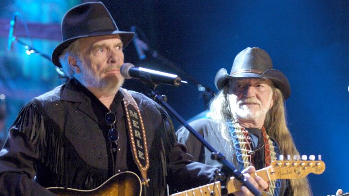 Iconic Rolling Stone photograph of Merle Haggard singing Okie from Muskokie (see embedded video below) with Willie Nelson. At the time Willie Nelson was known for his prodigious marijuana use, e.g.: 