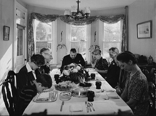 Saying grace before carving the turkey at Thanksgiving dinner in the home of Earle Landis in Neffsville, Pennsylvania, 1941, Marjory Collins, photographer for Farm Security Administration. - Photo by Marjory Collins. Farm Security Administration - Office of War Information Photograph Collection (Library of Congress}. During the 1930s and 1940s some of the greatest photographs were taken for USDA's Farm Security Administration.